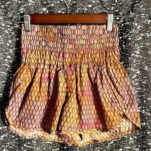 Super Snazzy Hippie Running Shorts! Built in underwear. Xtra Small but stretchy!